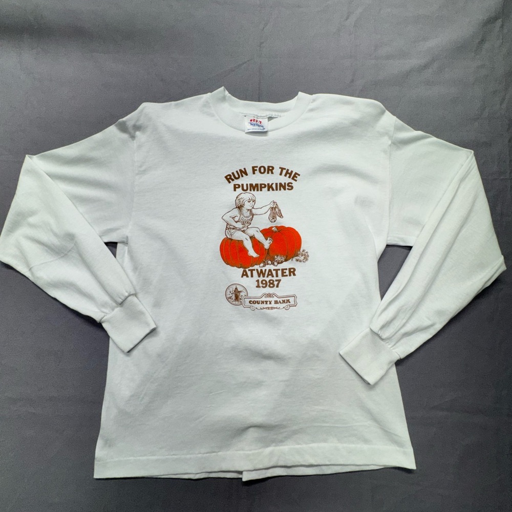 Vintage 80’s single stitch White Long Sleeve Graphic Tee made in USA